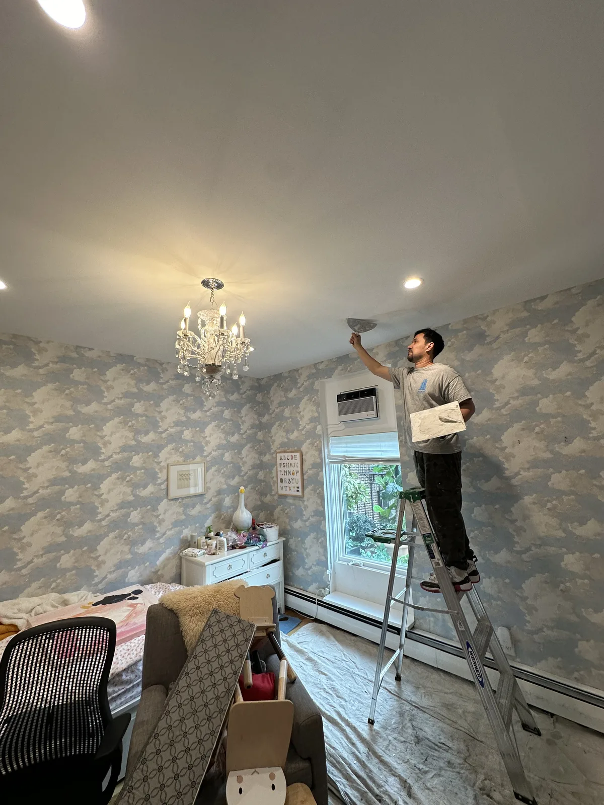 Plaster ceiling repair and skim coating during an apartment renovation in New York City