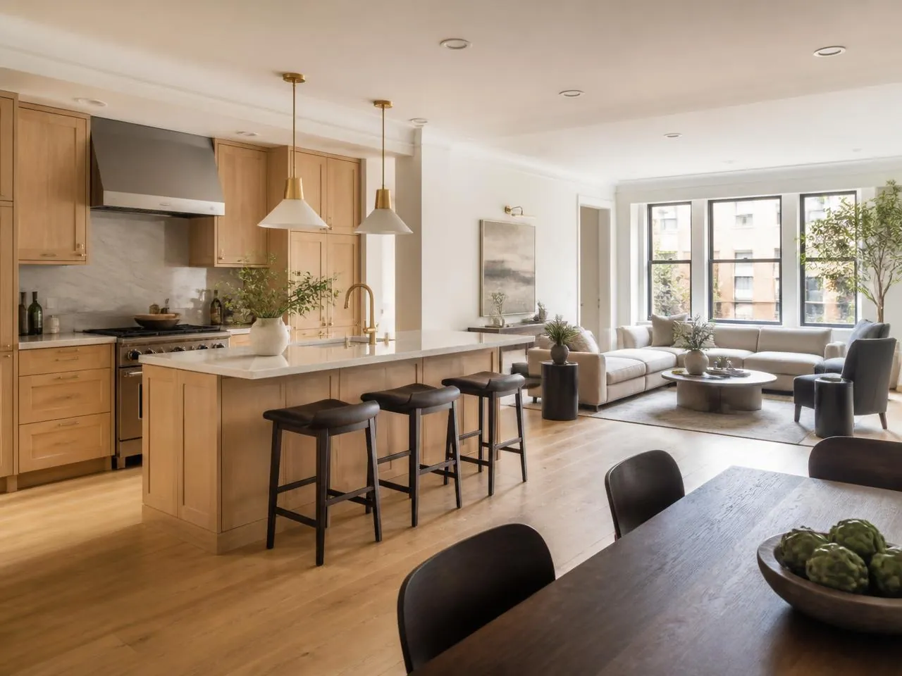 Finished NYC renovation delivered by a licensed general contractor with open plan kitchen and living room