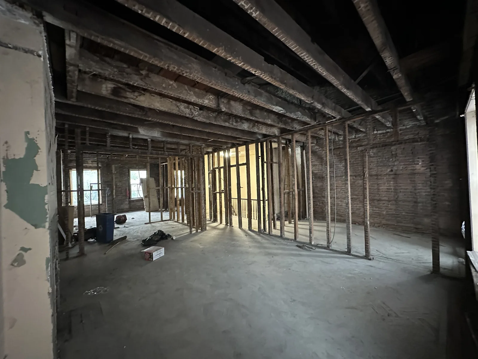 Apartment gut renovation stripped to brick and framing in New York City