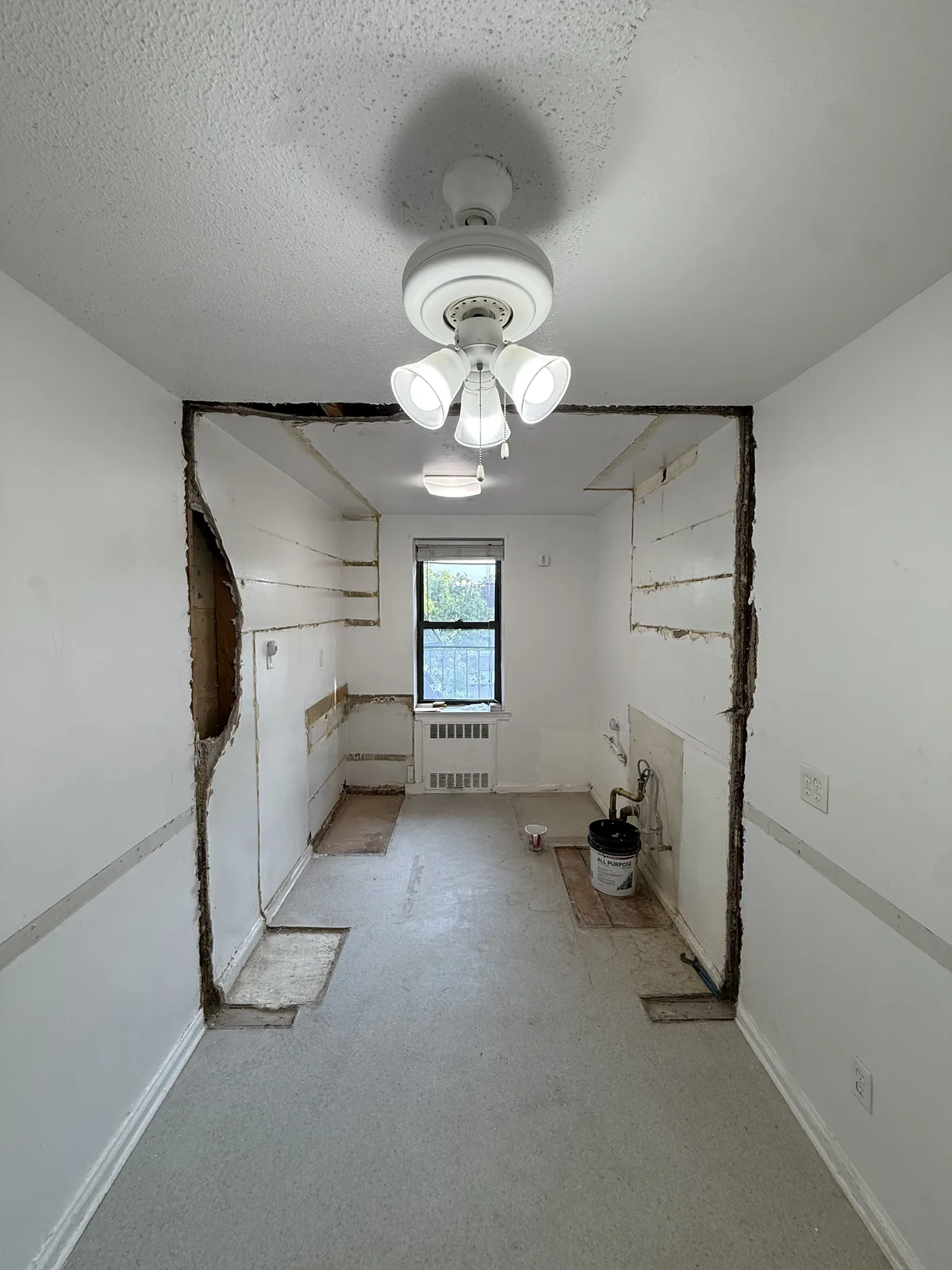 Wall removal during a gut renovation in Manhattan by Melani General Contractor