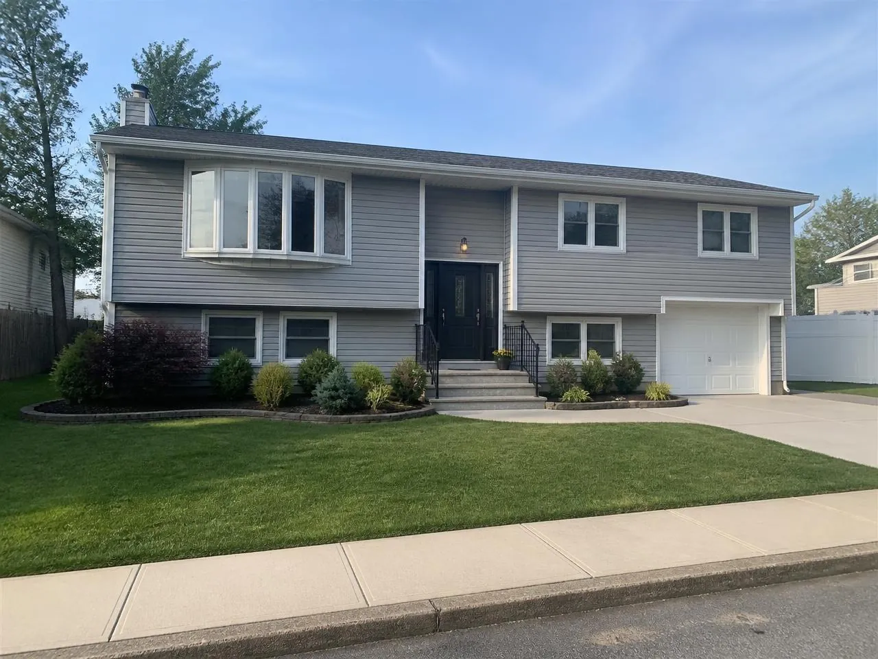 General contractor in Staten Island — Melani General Contractor home renovation with new siding, roof, and windows