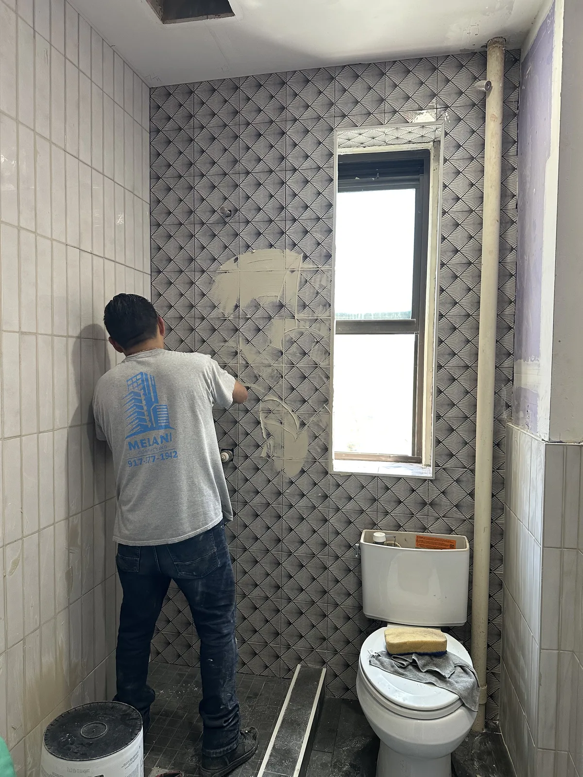Patterned bathroom tile installation in New York City