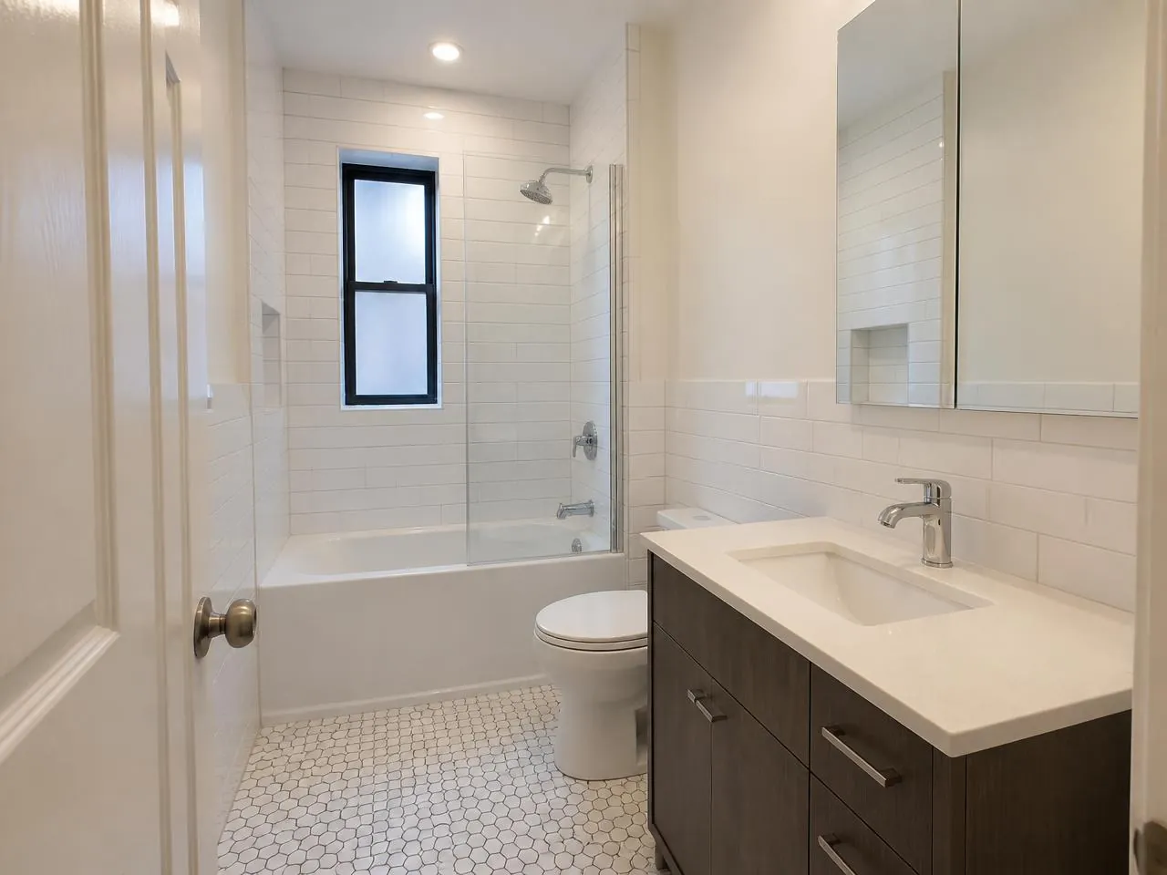 Bronx bathroom renovation by Melani General Contractor with new tile, tub, and vanity