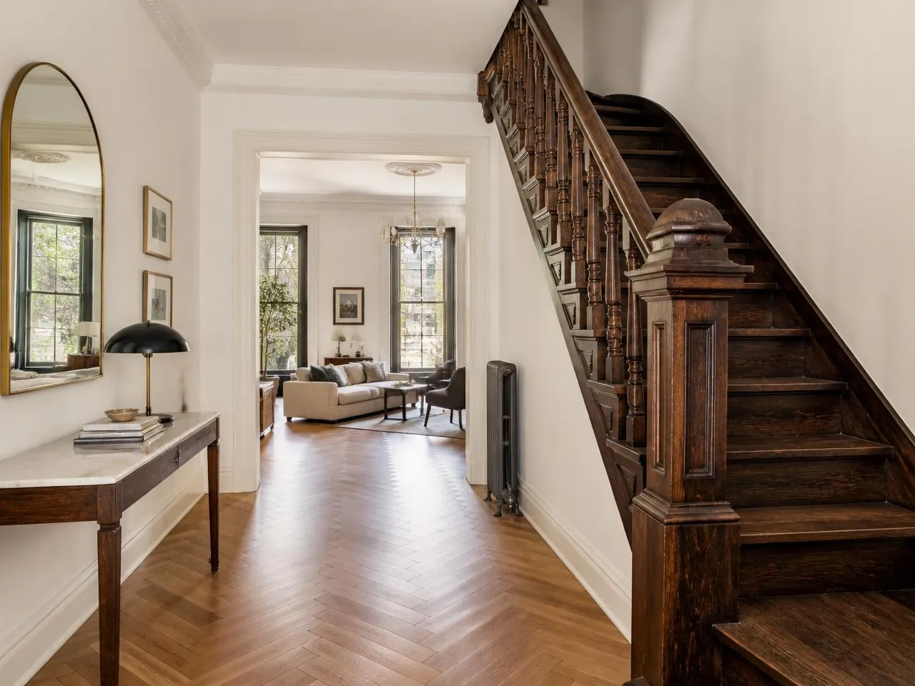 Complete townhouse renovation in NYC by Melani General Contractor with restored staircase and parlor floor