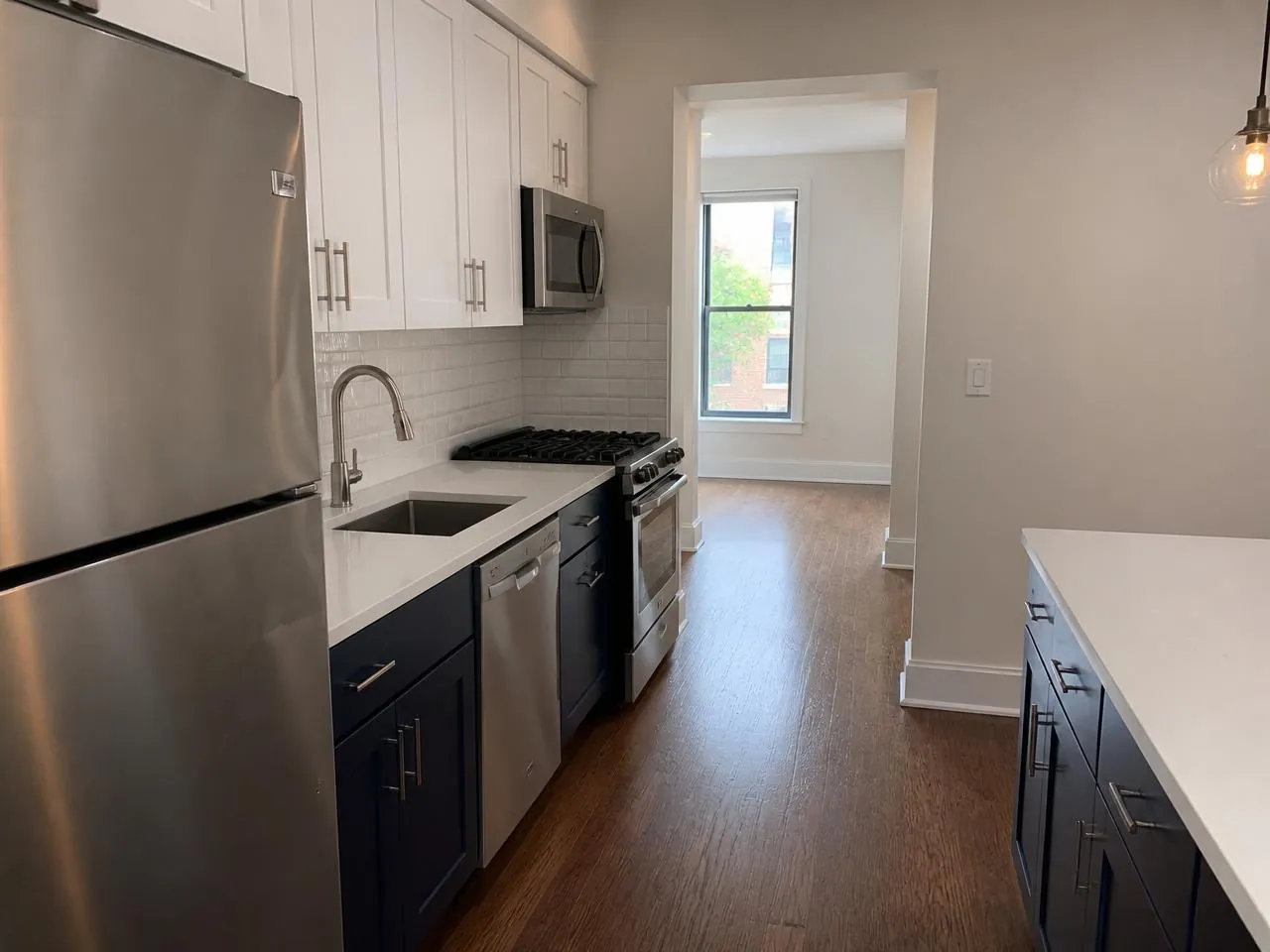 Bronx kitchen remodel by Melani General Contractor with custom cabinetry and quartz countertops
