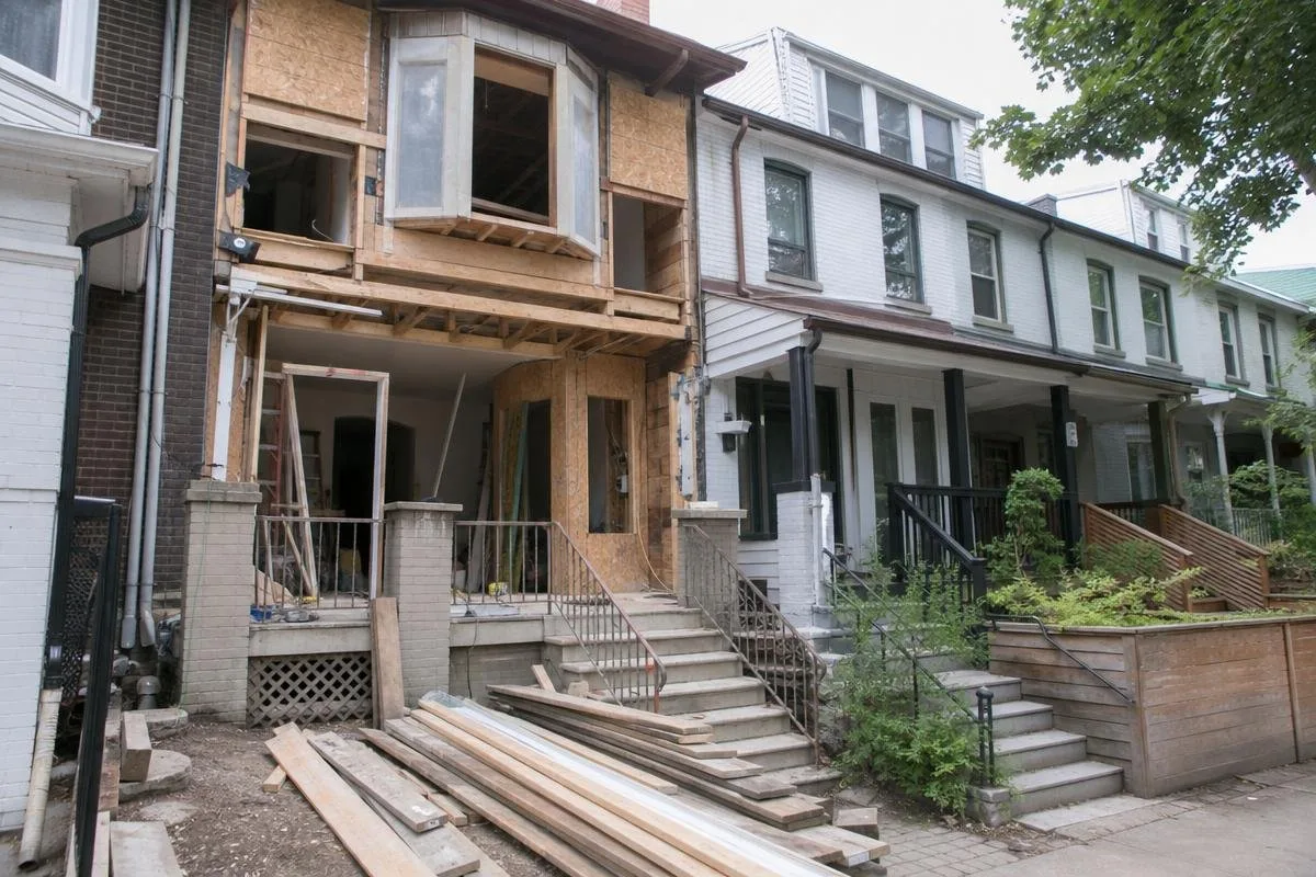 Attached townhouse undergoing exterior renovation